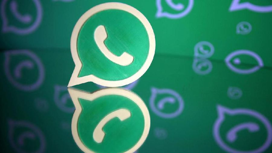 FILE PHOTO: A 3D printed Whatsapp logo is seen in front of a displayed Whatsapp logo in this illustration September 14, 2017. REUTERS/Dado Ruvic/File Photo