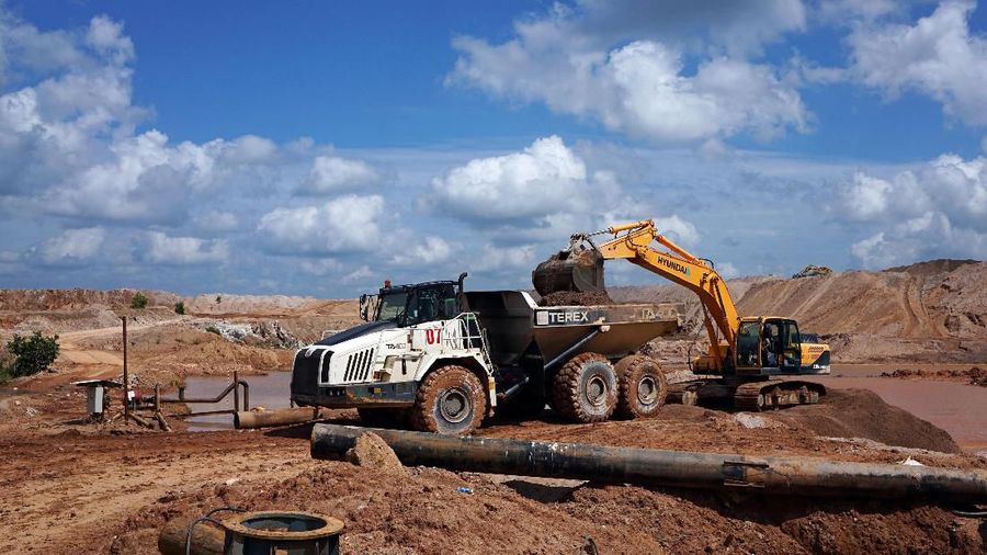 A truck passes through a tin mining area of Indonesia's PT Timah in Pemali, Bangka island, Indonesia, July 25, 2019. REUTERS/Fransiska Nangoy
