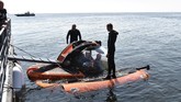 Kapal selam ShCh-308 'Syomga' saat itu ditugaskan untuk menghadapi armada kapal selam Angkatan Laut Jerman saat dipimpin Nazi. Mereka berhasil menenggelamkan tiga kapal angkut Nazi Jerman tetapi juga mengalami kerusakan karena serangan balasan. (Sputnik/Aleksey Nikolskyi/Kremlin via REUTERS)