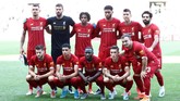 Manajer Liverpool Juergen Klopp sudah menampilkan beberapa pemain andalan, seperti Mohamed Salah, Roberto Firmino, Alisson Becker, sebagai starter dalam laga melawan Lyon. (REUTERS/Denis Balibouse)