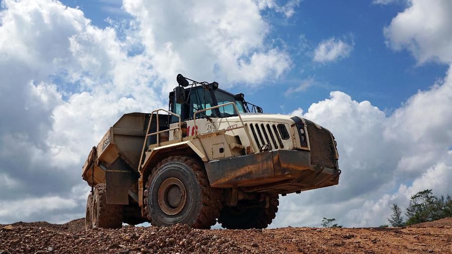 A truck passes through a tin mining area of Indonesia's PT Timah in Pemali, Bangka island, Indonesia, July 25, 2019. REUTERS/Fransiska Nangoy