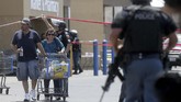 Situasi di lokasi mencekam namun sudah dalam kendali kepolisian. (Mark Lambie/The El Paso Times via AP)