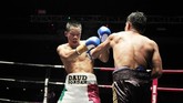 Daud Yordan berhasil mengalahkan lawannya Aekkawee Kaewmanee untuk merebut gelar WBC International Challenge kelas ringan super. Setelah ini, Daud mengincar gelar WBC World Silver. (Dok Mahkota Promotion)