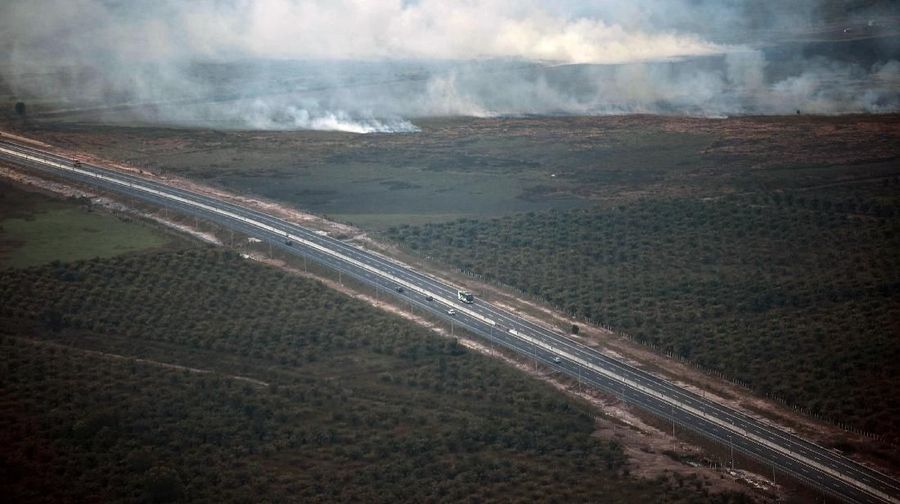 Peatlands fire is seen in Ogan Ilir regency, South Sumatra province, Indonesia, August 5, 2019 in this photo taken by Antara Foto. Picture taken August 5, 2019 Antara Foto/Mushaful Imam via REUTERS ATTENTION EDITORS - THIS IMAGE WAS PROVIDED BY A THIRD PARTY. MANDATORY CREDIT. INDONESIA OUT.