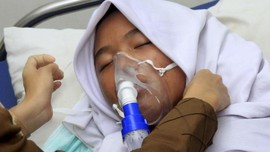 FOTO : Kabut Asap Karhutla Ancam Kesehatan Warga