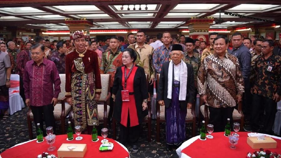 Jokowi menghadiri upacara peringatan Hari Ulang Tahun ke-58 Pramuka di Lapangan Utama Bumi Perkemahan Wiladatika, Cibubur, Jakarta Timur, Rabu (14/8/2019).