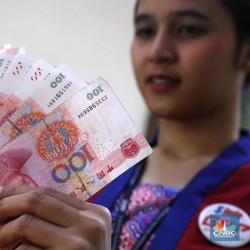 China Patok Nilai Tengah Yuan 7,0136 Per Dolar