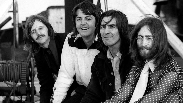 Members of the Beatles, Ringo Starr, Paul McCartney, George Harrison and John Lennon pose in Twickenham, Britain, August 9, 1969. Picture taken August 9, 1969. Bruce McBroom, Copyright Apple Corps Ltd/via REUTERS THIS IMAGE HAS BEEN SUPPLIED BY A THIRD PARTY. MANDATORY CREDIT. NO RESALES. NO ARCHIVES. FOR EDITORIAL USE ONLY IN REPORTING EVENTS OF THE ABBEY ROAD 50TH ANNIVERSARY FAN EVENT AND THE GLOBAL ANNOUNCEMENT RELATING TO THE LAUNCH OF THE 50TH ANNIVERSARY ALBUM SETS OF THE BEATLES. NO NEW USES AFTER 2359 ON DECEMBER 31, 2019. IMAGE MUST BE USED IN ITS ENTIRETY - NO CROPPING OR OTHER MODIFICATIONS.