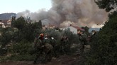 Kebakaran hutan di Yunani lazim terjadi di musim kemarau. Tahun lalu sebanyak 100 orang meninggal akibat karhutla di Desa Mati, sebelah utara Athena. (AP Photo/Yorgos Karahalis)