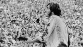 Musisi John Sebastian adalah salah seorang pengisi panggung di antara 31 penampil lainnya. (Baron Wolman/The Museum at Bethel Woods/Via REUTERS)