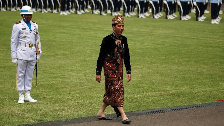 Indonesia President Joko Widodo walks after greet the commander of ceremony for celebrating Indonesia's 74th Independence Day at the Presidential Palace in Jakarta, Indonesia, August 17, 2019. REUTERS/Willy Kurniawan