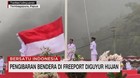 VIDEO: Pengibaran Bendera di Freeport Diguyur Hujan