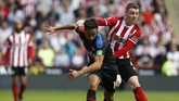 Liverpool's Roberto Firmino, centre, celebrates scoring his side's second goal of the game during the English Premier League soccer match between Southampton and Liverpool, at St Mary's, in Southampton, England, Saturday, Aug. 17, 2019. (Steven Paston/PA via AP)