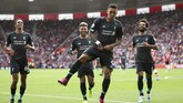 Liverpool meraih kemenangan kedua musim ini usai mengalahkan Southampton 2-1 berkat gol yang dicetak Sadio Mane dan Roberto Firmino di Stadion St's Mary, Sabtu (17/8). (Steven Paston/PA via AP)