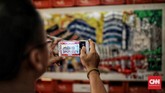 Rangkaian instalasi seni tentang kota Jakarta dan transportasi kereta api tampil menyemarakkan jalur pedestrian terowongan. (CNN Indonesia/Andry Novelino)