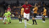Anthony Martial mencetak gol yang membuat MU unggul pada menit ke-27. (Nick Potts/PA via AP)