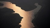 Meski kebakaran hutan dan lahan adalah hal yang lumrah selama musim kemarau, tapi tak jarang para petani lokal pun nakal membakar hutan demi membuka lahan. (REUTERS/Ueslei Marcelino)