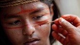 Padahal selama tiga pekan terakhir 'huniannya' tengah dikepung asap akibat kebakaran hutan terparah sepanjang masa. (REUTERS/Ueslei Marcelino)