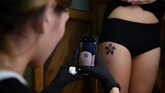 Demonstrasi yang sudah memasuki pekan ke-11 dan sebagian besar unjuk rasa berujung ricuh hingga aparat harus menembakkan gas air mata dan melemparkan granat untuk memecah massa. (Lillian SUWANRUMPHA / AFP)