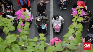 FOTO: Pawai Penyandang Disabilitas Serukan Tolak Diskriminasi
