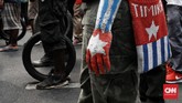 Selain aksi di depan Mabes TNI AD, puluhan pemuda Papua lain juga menggelar demo di depan Istana Merdeka dan beberapa daerah lain di Indoneisa. (CNN Indonesia/Andry Novelino)