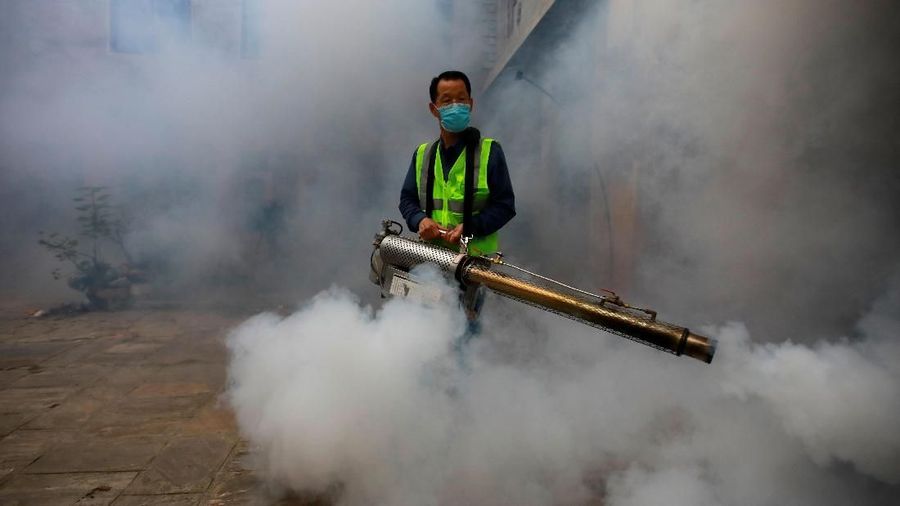 A worker fumigates a resident area to prevent the spread of the dengue fever and other mosquito-borne diseases in Kathmandu, Nepal September 5, 2019. REUTERS/Navesh Chitrakar