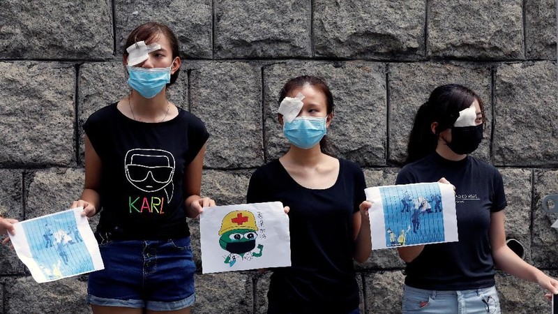Pelajar dan mahasiswa Hong Kong seharusnya kembali ke sekolah mulai dari Hari Senin (02/09), namun 30.000 orang masih lanjutkan aksi protes.