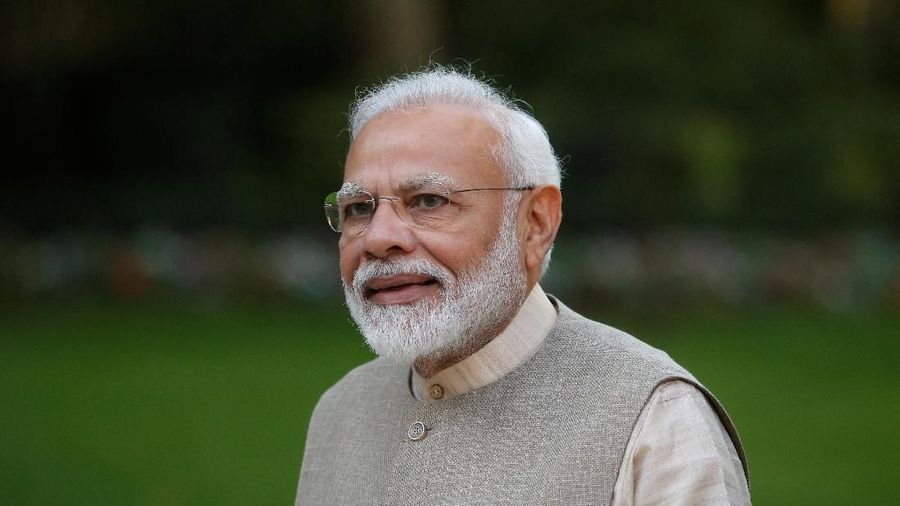 Indian Prime Minister Narendra Modi walks in the garden of the French Prime Minister's residence before their talks in Paris, France August 23, 2019. Michel Spingler/Pool via REUTERS