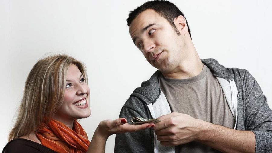 Girl is taking out money from wallet