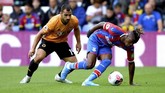 Wolverhampton Wanderers belum juga meraih kemenangan di Liga Inggris musim ini. Pada pekan keenam, The Wanderers bermain imbang 1-1 dengan Crystal Palace. (AP Photo/Frank Augstein)