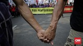 Masa gabungan petani, mahasiswa dan buruh melakukan aksi di depan Istana Negara menolak pengesahan RUU Pertanahan dan RUU Sistem Budidaya Pertanian Berkelanjutan (SBPB). Jakarta, Selasa, 24 September 2019. (CNN Indonesia/Adhi Wicaksono).