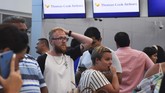 Saat ini, terdapat sekitar 600 ribu turis yang sedang berlibur dan menggunakan jasa Thomas Cook. (Photo by ELIZABETH RUIZ / AFP)