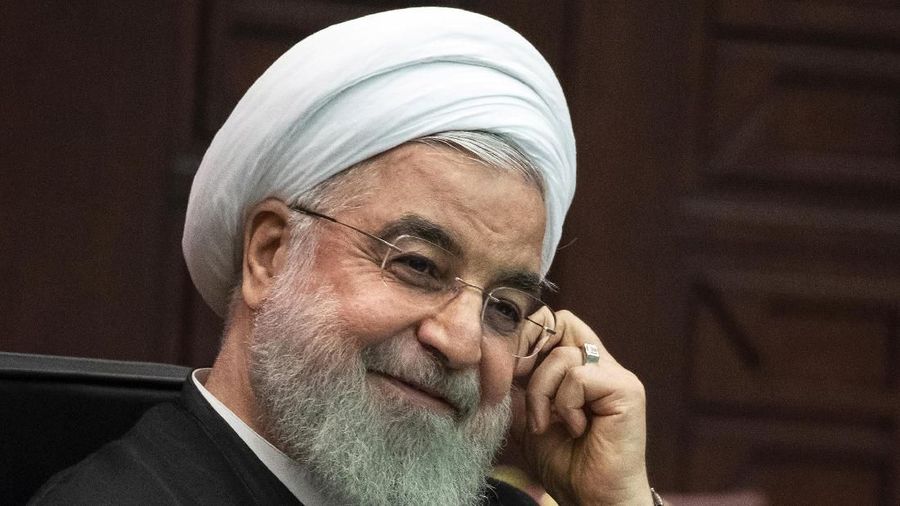 FILE - In this Sept. 16, 2019, file photo, Iranian President Hassan Rouhani attends a joint news conference in Ankara, Turkey. Rouhani reiterated Tuesday, Sept. 24, that he would not consider meeting with President Donald Trump unless sanctions imposed against his country since 2018 were first lifted. (AP Photo/Pavel Golovkin, Pool, File)