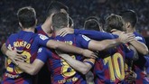 Barcelona membuka keunggulan pada menit keenam melalui gol Antoine Griezmann yang memanfaatkan umpan Lionel Messi. (AP Photo/Joan Monfort)