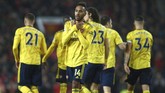 Arsenal untuk kali pertama tidak terkalahkan di Old Trafford dalam dua laga beruntun di Liga Inggris sejak 2000. Pada musim lalu, The Gunners sukses menahan imbang MU 2-2. (AP Photo/Dave Thompson)