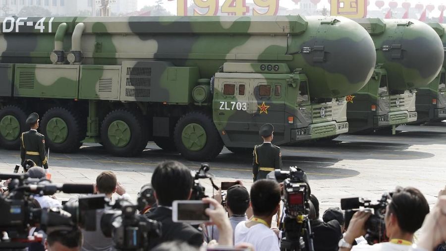 Military vehicles carrying DF-41 intercontinental ballistic missiles travel past Tiananmen Square during the military parade marking the 70th founding anniversary of People's Republic of China, on its National Day in Beijing, China October 1, 2019. REUTERS/Jason Lee