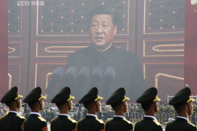 Chinese United Nations (UN) peacekeeping forces march in formation during a parade to commemorate the 70th anniversary of the founding of Communist China in Beijing, Tuesday, Oct. 1, 2019. Trucks carrying weapons including a nuclear-armed missile designed to evade U.S. defenses rumbled through Beijing as the Communist Party celebrated its 70th anniversary in power with a parade Tuesday that showcased China's ambition as a rising global force. (AP Photo/Mark Schiefelbein)