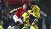 Gol ke gawang Arsenal adalah yang pertama bagi Scott McTominay (kiri) dalam 25 pertandingan kandang MU di semua kompetisi. Total McTominay sudah mengemas tiga gol untuk MU di semua ajang. (AP Photo/Dave Thompson)