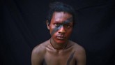 Dari generasi ke generasi, penduduk pribumi Tembe di Amazon telah melukis tubuh mereka untuk ritual peralihan, pernikahan, serta melambangkan mereka siap berperang. (AP Photo/Rodrigo Abd)