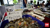 Numismatik artinya merujuk pada alat pembayaran sah yang mencakup kaon, token, uang kertas, maupun benda serupa lainnya. (CNNIndonesia.com/Daniela Dinda)