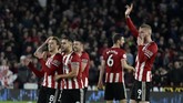Pemain Sheffield United merayakan kemenangan dengan suka cita usai menaklukkan Arsenal di Bramall Lane. (AP Photo/Rui Vieira)