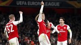 Nicolas Pepe akhirnya memberi kemenangan dramatis untuk Arsenal saat melawan Vitoria setelah tendangan bebasnya saat injury time memasuki menit ketiga membuahkan gol ketiga The Gunners. (AP Photo/Alastair Grant)