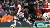 Pelatih Arsenal Unai Emery memutuskan untuk memasukkan Nicolas Pepe pada menit ke-75 untuk menambah daya gedor. (AP Photo/Alastair Grant)