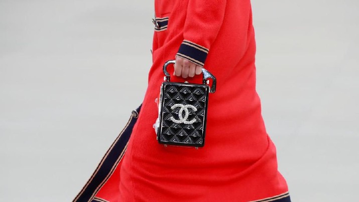 Chanel FILE PHOTO: A model presents a creation during the Cruise 2020 collection show for French fashion house Chanel at the Grand Palais in Paris, France, May 3, 2019. REUTERS/Gonzalo Fuentes/File Photo