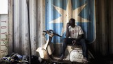Buat warga Mali, Vespa merupakan simbol era 1960-an dan 1970-an saat negara di Afrika ini dalam kondisi damai dan kota-kota banyak didatangi pengunjung. (MICHELE CATTANI / AFP)
