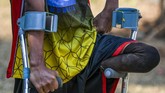 Melalui prestasi yang diraih, tim Garuda INAF terus memperjuangkan hak-hak mereka dalam dunia olahraga. Keterbatasan fisik bukan penghalang bagi mereka untuk mengibarkan Merah Putih di tiang tertinggi. (ANTARA FOTO/Galih Pradipta)