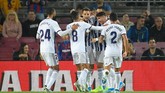 Real Valladolid sempat memberi perlawanan. Kiko Olivas menyamakan kedudukan ketika pertandingan memasuki menit ke-15. (Photo by LLUIS GENE / AFP)