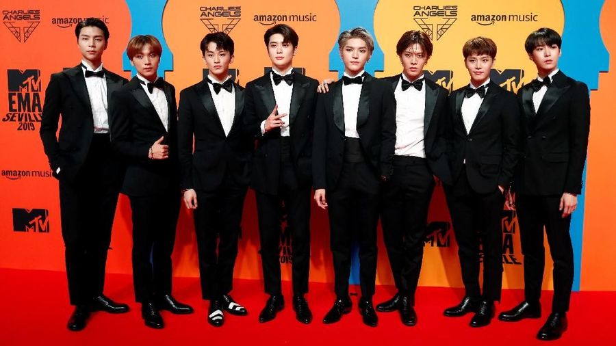 NCT 127 poses on a red carpet as they arrive at the 2019 MTV Europe Music Awards at the FIBES Conference and Exhibition Centre in Seville, Spain, November 3, 2019. REUTERS/Jon Nazca