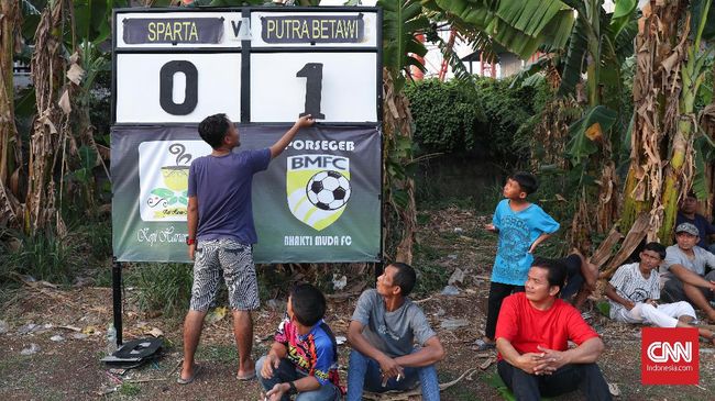 Dukun Tim Sebagai Pemain ke-13 Sepakbola Tarkam