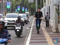 Sah! Pakai Skuter Listrik di Jalan Raya Denda Rp 250 Ribu